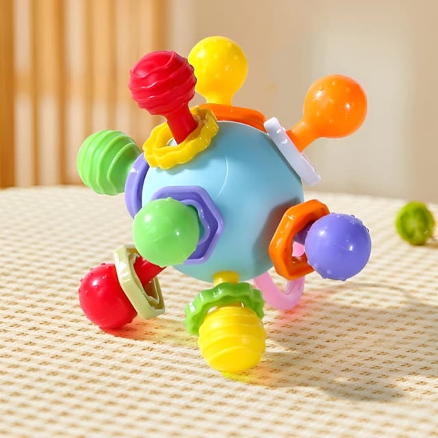 Bola de aperto de mão, cola para dentes, manhattan, brinquedo com som de chocalho potável